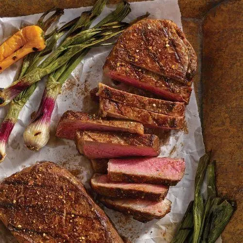 Omaha Steaks 4 (10 oz.) Boneless New York Strips + Seasoning (Boneless New York Strips and Omaha Steaks Seasoning)